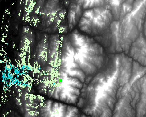 Image showing a digital elevation map with areas highlighted representing a viewshed from a specific location.